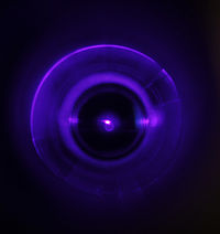 Yb blue MOT in our experiment. We have loaded a MOT from a slow buffer-gas beam source. We also show can test the effects of a cold buffer-gas beam on MOTs.